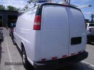 2015 Chevrolet Express Cargo Van with VIN 1GCWGFCF2F1152034, listed as a IAAI auction lot 42133291 with 155,996 mi miles. Bid and sale history available at carsss.com. Image 1.