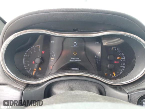 2015 Jeep Grand Cherokee Summit with VIN 1C4RJFJG2FC913658, listed as a Copart auction lot 52160035 with 138,008 mi miles and Salvage Title. Bid and sale history available at DreamBid. Image 9.