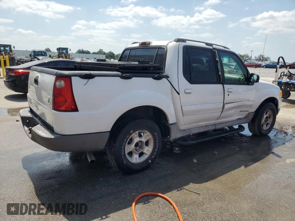 2002 Ford Explorer Sport Trac Value with VIN 1FMZU67E42UD15004, listed as a Copart auction lot 54129135 with 129,952 mi miles and Salvage title. Bid and sale history available at DreamBid. Image 3.