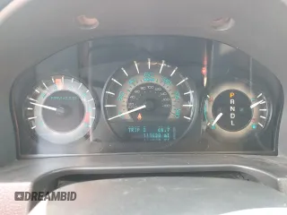2010 Mercury Milan z VIN 3MEHM0HA3AR607241, wystawiony jako Copart lot #61225435 z przebiegiem 111 038 mil mil oraz Szkoda całkowita • Salvage title. Historia ofert i sprzedaży dostępna na DreamBid. Obrazek 9.
