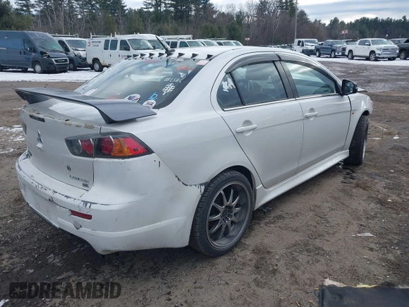 2017 Mitsubishi Lancer ES with VIN JA32V2FW8HU006570, listed as a IAAI auction lot 41366177 with 138,247 mi miles. Bid and sale history available at carsss.com. Image 4.