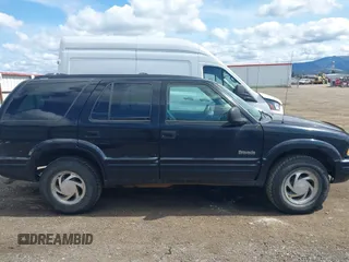 1997 Oldsmobile Bravada z VIN 1GHDT13W3V2707243, wystawiony jako IAAI lot #42024114 z przebiegiem 185 219 mil mil oraz . Historia ofert i sprzedaży dostępna na DreamBid. Obrazek 13.