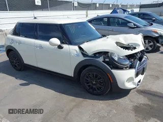 2019 MINI Hardtop 4 Door Cooper S with VIN WMWXU3C51K2H87205, listed as a IAAI auction lot 41985446 with 58,648 mi miles and . Bid and sale history available at DreamBid. Image 1.
