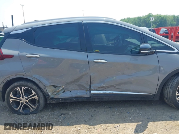 2021 Chevrolet Bolt EV Premier z VIN 1G1FZ6S01M4106836, wystawiony jako IAAI lot #42438764 z przebiegiem 27 894 mil mil oraz . Historia ofert i sprzedaży dostępna na DreamBid. Obrazek 6.
