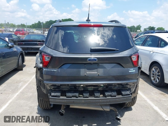 2019 Ford Escape SE z VIN 1FMCU0GD0KUB74569, wystawiony jako IAAI lot #42271476 z przebiegiem 66 335 mil mil oraz . Historia ofert i sprzedaży dostępna na DreamBid. Obrazek 17.