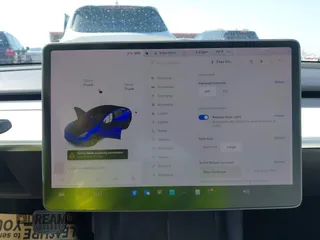2021 Tesla Model 3 Long Range z VIN 5YJ3E1EB0MF860289, wystawiony jako IAAI lot #41771854 z przebiegiem 190 892 mil mil oraz . Historia ofert i sprzedaży dostępna na DreamBid. Obrazek 7.