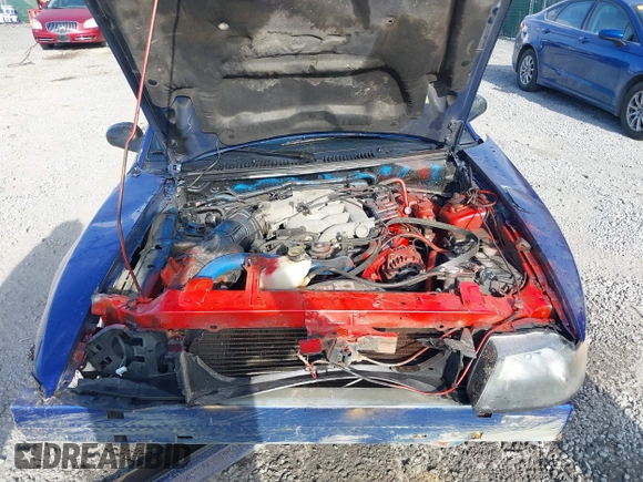 2002 Ford Mustang Standard z VIN 1FAFP40422F210590, wystawiony jako IAAI lot #40721980 z przebiegiem 151 316 mil mil oraz . Historia ofert i sprzedaży dostępna na DreamBid. Obrazek 10.
