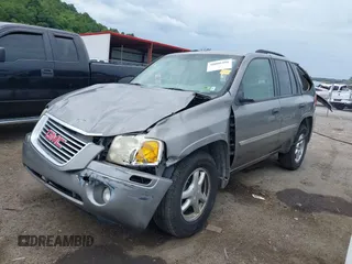 2007 GMC Envoy SLE with VIN 1GKDS13S272278285, listed as a IAAI auction lot 40006486 with 158,109 mi miles. Bid and sale history available at carsss.com. Image 2.