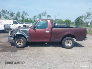2000 Ford F-150 XL with VIN 1FTZF1721YNB05244, listed as a IAAI auction lot 42298391 with Not provided miles and . Bid and sale history available at DreamBid. Image 14.