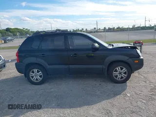 2007 Hyundai Tucson SE with VIN KM8JN12DX7U573823, listed as a IAAI auction lot 41238550 with 79,641 mi miles. Bid and sale history available at carsss.com. Image 13.