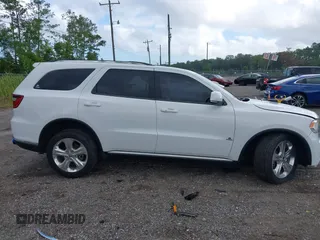 2015 Dodge Durango Limited with VIN 1C4RDJDGXFC947109, listed as a IAAI auction lot 39715331 with 152,655 mi miles and . Bid and sale history available at carsss.com. Image 13.