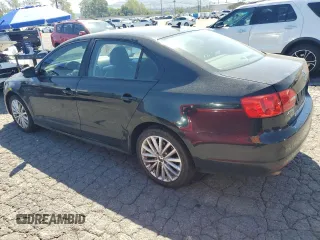 2012 Volkswagen Jetta SEL with VIN 3VWLP7AJ0CM327814, listed as a Copart auction lot 52235685 with 97,705 mi miles and Salvage title. Bid and sale history available at DreamBid. Image 2.
