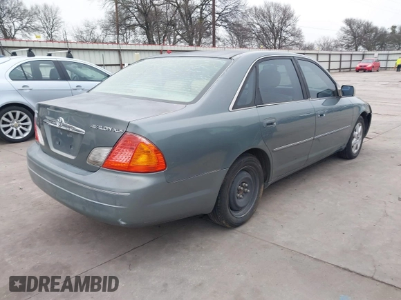 2002 Toyota Avalon XL with VIN 4T1BF28BX2U262186, listed as a IAAI auction lot 41572610 with 164,899 mi miles and . Bid and sale history available at DreamBid. Image 4.