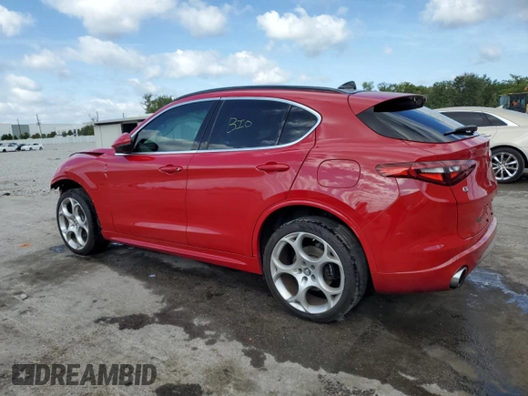 2023 Alfa Romeo Stelvio Ti z VIN ZASPAKBN2P7D65711, wystawiony jako Copart lot #55311535 z przebiegiem 32 906 mil mil oraz Nie do naprawy. Historia ofert i sprzedaży dostępna na DreamBid. Obrazek 2.