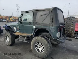 2002 Jeep Wrangler Sahara with VIN 1J4FA59S42P742978, listed as a Copart auction lot 46707685 with 77,272 mi miles and Salvage Title. Bid and sale history available at carsss.com. Image 2.