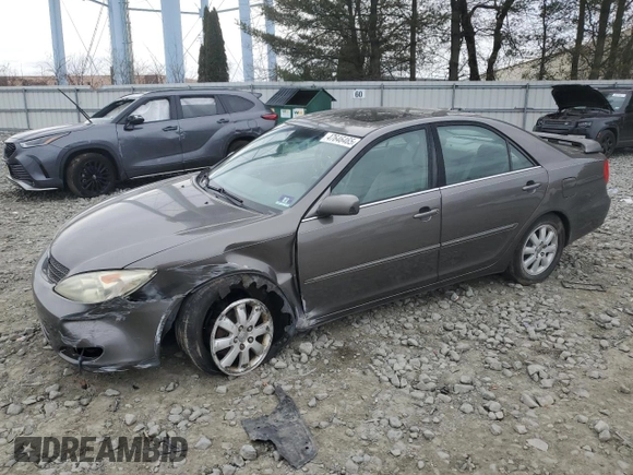 2004 Toyota Camry LE with VIN 4T1BE30K14U918475, listed as a Copart auction lot 47646465 with 258,973 mi miles and Salvage Title. Bid and sale history available at DreamBid. Image 1.