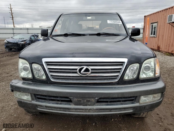 2003 Lexus LX 470 with VIN JTJHT00W333526380, listed as a Copart auction lot 77356534 with 151,636 mi miles and Salvage Title. Bid and sale history available at carsss.com. Image 5.