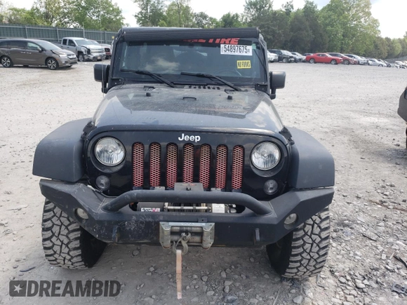 2014 Jeep Wrangler Unlimited Rubicon with VIN 1C4BJWFGXEL291187, listed as a Copart auction lot 54897675 with 227,478 mi miles and Salvage title. Bid and sale history available at DreamBid. Image 5.