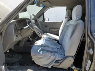 1990 Toyota Pickup DLX with VIN JT4RN93P3L5021924, listed as a Copart auction lot 64699075 with 287,298 mi miles and Clean title. Bid and sale history available at DreamBid. Image 7.