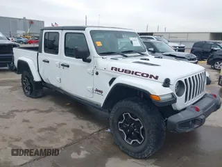 2020 Jeep Gladiator Rubicon with VIN 1C6JJTBG9LL171398, listed as a IAAI auction lot 41390927 with 42,812 mi miles and . Bid and sale history available at DreamBid. Image 1.