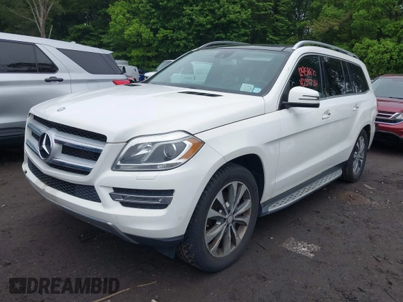 2014 Mercedes-Benz GL 450 with VIN 4JGDF7CE5EA408944, listed as a IAAI auction lot 42397384 with 182,106 mi miles and . Bid and sale history available at DreamBid. Image 2.