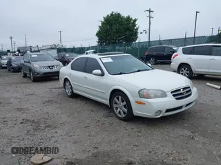 2003 Nissan Maxima GLE z VIN JN1DA31A03T435582, wystawiony jako IAAI lot #42518091 z przebiegiem 106 649 mil mil oraz . Historia ofert i sprzedaży dostępna na DreamBid. Obrazek 1.