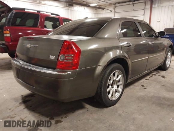 2010 Chrysler 300 Touring with VIN 2C3CA5CV9AH213299, listed as a IAAI auction lot 41754215 with 172,467 mi miles. Bid and sale history available at carsss.com. Image 4.