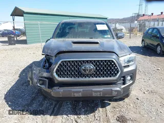 2018 Toyota Tacoma SR with VIN 5TFCZ5AN9JX123749, listed as a IAAI auction lot 41768884 with 42,852 mi miles and . Bid and sale history available at DreamBid. Image 12.