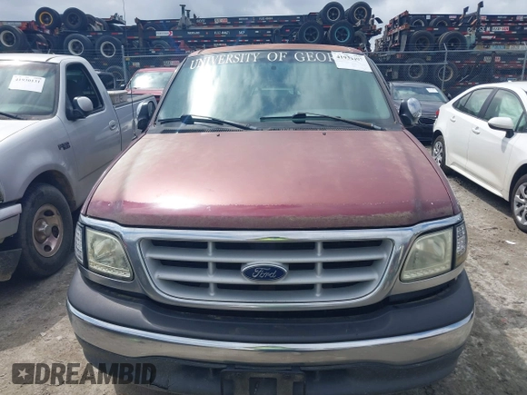 1999 Ford F-150 with VIN 1FTRX17W2XNB98256, listed as a IAAI auction lot 41931497 with Not Provided miles and . Bid and sale history available at DreamBid. Image 12.