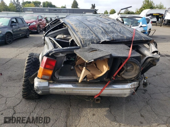 1996 Jeep Cherokee Country with VIN 1J4FJ78S9TL240411, listed as a Copart auction lot 75714034 with 247,274 mi miles and Non Repairable. Bid and sale history available at carsss.com. Image 6.