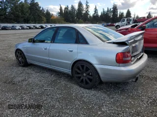2000 Audi S4 z VIN WAUDD68D7YA179687, wystawiony jako Copart lot #77201694 z przebiegiem 165 118 mil mil oraz Szkody całkowita. Historia ofert i sprzedaży dostępna na DreamBid. Obrazek 2.