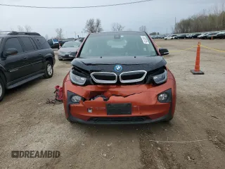2015 BMW i3 z VIN WBY1Z4C56FV278503, wystawiony jako Copart lot #51533125 z przebiegiem 31 261 mil mil oraz Szkody całkowita. Historia ofert i sprzedaży dostępna na DreamBid. Obrazek 5.
