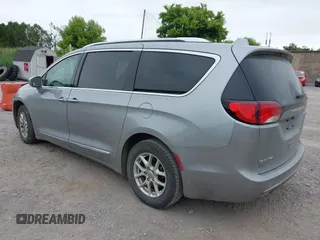 2020 Chrysler Pacifica Touring L with VIN 2C4RC1BG2LR127986, listed as a IAAI auction lot 42419518 with 107,618 mi miles and . Bid and sale history available at DreamBid. Image 3.