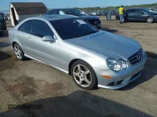 2007 Mercedes-Benz CLK-Class 5.5L with VIN WDBTJ72H97F209555, listed as a IAAI auction lot 42081006 with 137,436 mi miles. Bid and sale history available at carsss.com. Image 1.