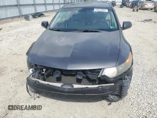 2012 Acura TSX z VIN JH4CU2F4XCC007997, wystawiony jako Copart lot #59993885 z przebiegiem 124 287 mil mil oraz Szkoda całkowita • Salvage title. Historia ofert i sprzedaży dostępna na DreamBid. Obrazek 5.