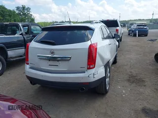 2014 Cadillac SRX Performance Collection with VIN 3GYFNFE34ES677712, listed as a IAAI auction lot 42668059 with 150,135 mi miles and . Bid and sale history available at DreamBid. Image 16.