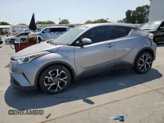 2018 Toyota C-HR XLE z VIN NMTKHMBX5JR014184, wystawiony jako Copart lot #59928775 z przebiegiem 70 441 mil mil oraz Szkoda całkowita • Salvage title. Historia ofert i sprzedaży dostępna na DreamBid. Obrazek 1.