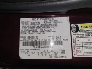 2011 Ford Fusion SEL with VIN 3FAHP0JA6BR201870, listed as a IAAI auction lot 42159069 with 157,656 mi miles. Bid and sale history available at carsss.com. Image 9.