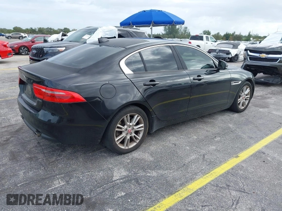 2017 Jaguar XE 25t Premium with VIN SAJAD4BG4HA956227, listed as a IAAI auction lot 40573821 with 152,395 mi miles. Bid and sale history available at carsss.com. Image 4.
