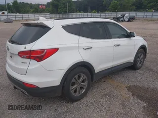 2016 Hyundai Santa Fe z VIN 5XYZU3LB0GG345673, wystawiony jako IAAI lot #42290297 z przebiegiem 75 701 mil mil oraz . Historia ofert i sprzedaży dostępna na DreamBid. Obrazek 4.