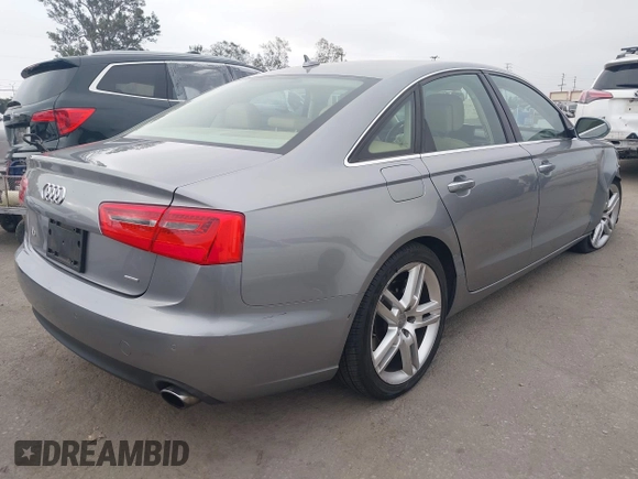 2015 Audi A6 Premium Plus z VIN WAUGFAFC6FN009203, wystawiony jako IAAI lot #42242726 z przebiegiem 69 163 mil mil oraz . Historia ofert i sprzedaży dostępna na DreamBid. Obrazek 4.