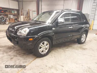 2007 Hyundai Tucson SE with VIN KM8JN12D97U636846, listed as a IAAI auction lot 41818368 with 199,996 mi miles. Bid and sale history available at carsss.com. Image 2.