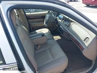 2004 Mercury Grand Marquis GS with VIN 2MEFM74W44X673224, listed as a IAAI auction lot 40670734 with 83,219 mi miles. Bid and sale history available at carsss.com. Image 5.