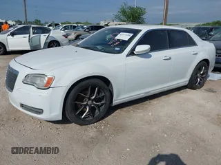 2013 Chrysler 300 Motown with VIN 2C3CCAAGXDH530004, listed as a IAAI auction lot 41973189 with 105,213 mi miles. Bid and sale history available at carsss.com. Image 2.