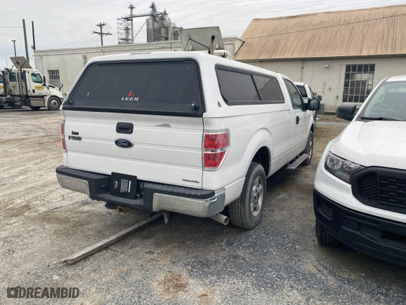 2014 Ford F-150 XL with VIN 1FTNF1CF5EKD79597, listed as a IAAI auction lot 41511800 with 100,758 mi miles. Bid and sale history available at carsss.com. Image 4.