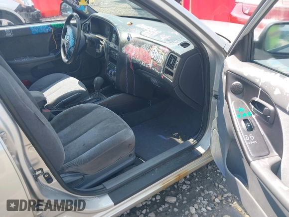 2005 Hyundai Elantra GLS with VIN KMHDN46D15U111432, listed as a IAAI auction lot 42408543 with 198,013 mi miles and . Bid and sale history available at DreamBid. Image 5.