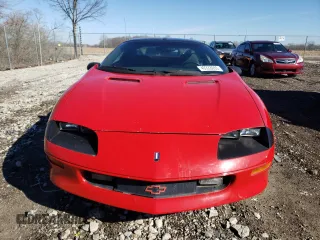 1994 Chevrolet Camaro z VIN 2G1FP22SXR2165249, wystawiony jako Copart lot #49333055 z przebiegiem 196 736 mil mil oraz Czysty tytuł • Clean title. Historia ofert i sprzedaży dostępna na DreamBid. Obrazek 5.