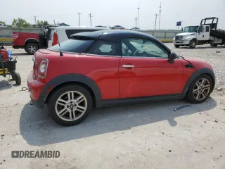 2013 MINI Cooper Coupe with VIN WMWSX1C57DT507660, listed as a Copart auction lot 63930314 with 119,945 mi miles and Non Repairable. Bid and sale history available at carsss.com. Image 3.
