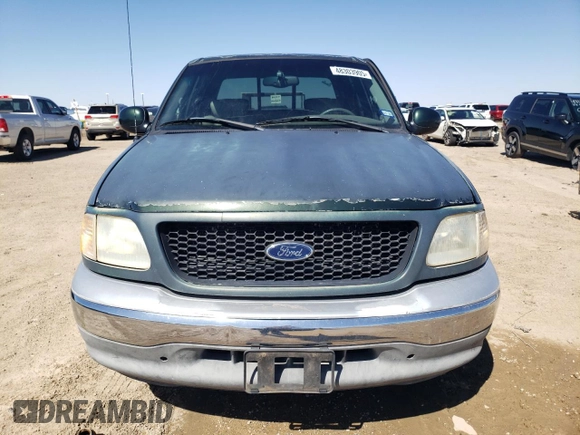 2001 Ford F-150 XLT with VIN 1FTRW07L21KF52515, listed as a Copart auction lot 48303905 with 236,567 mi miles and Salvage title. Bid and sale history available at DreamBid. Image 5.