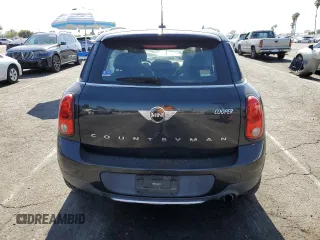 2016 MINI Countryman with VIN WMWZB3C58GWR47074, listed as a Copart auction lot 57174885 with 83,062 mi miles and Salvage title. Bid and sale history available at DreamBid. Image 6.